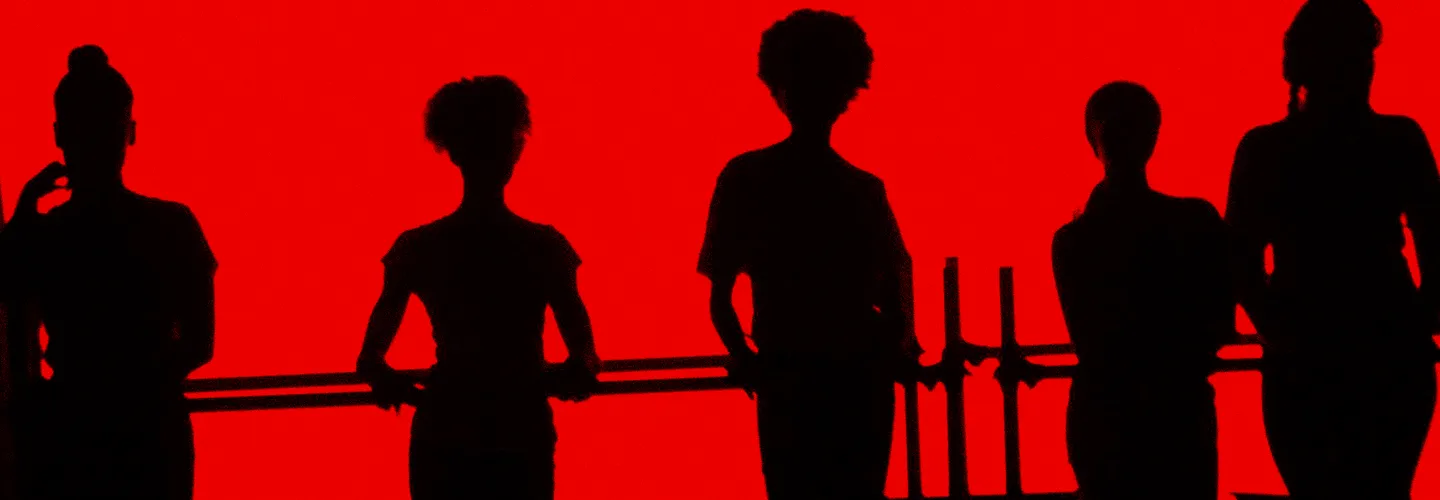 Silhouettes of actors against red background
