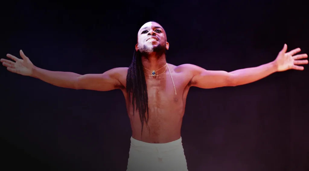 Performer with outstretched arms